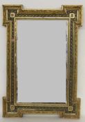 WANDSPIEGEL um 1900 Rechteckform mit facettiertem Spiegelglas und vergoldetem Stuckrahmen. 90x62cm