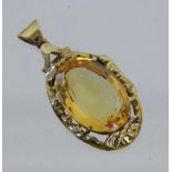 ANHÄNGER, 585/000 Gelbgold mit Citrin. L.3,8cm, Brutto ca. 6,8g A PENDANT 585/000 yellow gold with