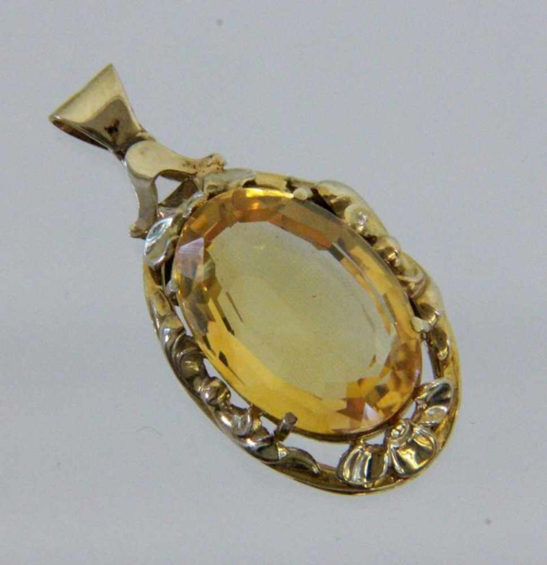 ANHÄNGER, 585/000 Gelbgold mit Citrin. L.3,8cm, Brutto ca. 6,8g A PENDANT 585/000 yellow gold with