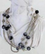 COLLIER, Silber mit Schneeflocken-Obsidianen. L.98cm A NECKLACE Silver with snowflake obsidians.