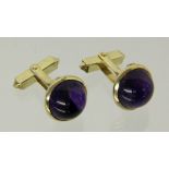 PAAR MANSCHETTENKNÖPFE 585/000 Gelbgold mit Amethysten. Brutto ca. 11,1g A PAIR OF CUFFLINKS 585/000