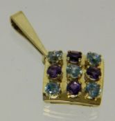 ANHÄNGER 585/000 Gelbgold mit Amethysten und Zirkonen. L.4,3cm, Brutto ca. 7,1g A PENDANT 585/000