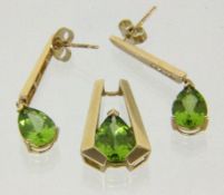 ANHÄNGER UND PAAR OHRSTECKER 585/000 Gelbgold mit Peridot und Diamanten. Brutto ca. 5,9g A PENDANT