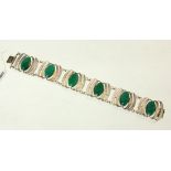 ARMBAND 835/000 Silber mit 6 Jade-Cabochons. L.20,5cm. Ohne Stempel, geprüft. Brutto ca. 47g A