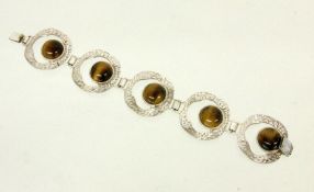 ARMBAND Silber mit 5 Tigerauge-Cabochons. L.19,5cm. Ohne Stempel, geprüft. Brutto ca. 54g A BRACELET