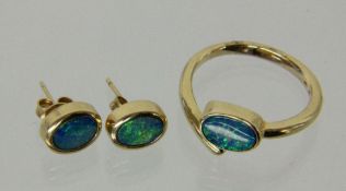 DAMENRING UND PAAR OHRSTECKER 585/000 Gelbgold mit schwarzem Opal auf Muttergestein. Ringgr. 56.