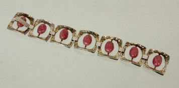 ARMBAND 835/000 Silber mit 7 Rhodochrosit-Cabochons. L.19,5cm. Gest., Brutto ca. 55g A BRACELET