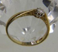 JUGENDSTIL BRILLANTRING um 1900Brillantschliff von ca. 0,15ct. Floral gravierte Schiene. Ringgr. 58,