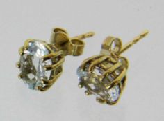 PAAR OHRSTECKER585/000 Gelbgold mit Aquamarinen. 5x8mm, Brutto ca. 1,8gA PAIR OF STUD EARRINGS 585/