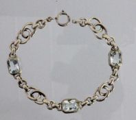 ARMBANDSilber vergoldet mit Aquamarinen. L.18,5cm, Brutto ca. 13gA BRACELET Gilt silver with