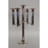 DESIGNER KERZENLEUCHTERVerchromtes Metall, 5-flammig. Bez.: Fink. H.47,5cmA DESIGNER CANDLESTICK