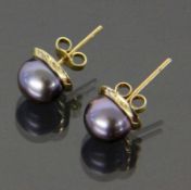 PAAR OHRSTECKER585/000 Gelbgold mit Tahitiperle von ca. 10mm. Brutto ca. 4gA PAIR OF STUD EARRINGS