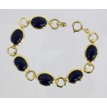 ARMBANDSilber vergoldet mit Lapislazuli-Cabochons. L.18cm, Brutto ca. 16,2gA BRACELET Gilt silver