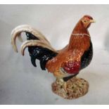 A Beswick pottery model of a Gamecock, impressed number 2059 23cm high