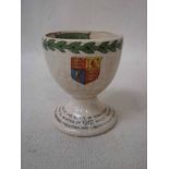 Great War interest, a pottery egg cup printed with British shield, typical U shape inscribed with