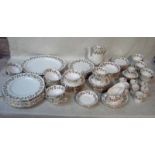 A Shelley table service comprising of eighty five pieces in the Wine Grape pattern, two 37cm oval