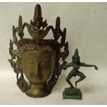 An Eastern, possibly Tibetan, bronze Mask of a Goddess, with jewelled headdress, 25cm high and a