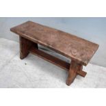 An Elm Arts & Crafts Bench in style and manner of Cotswold School, trestle design, 39cm by 91cm by