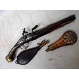 A late 18th/early 19th century military style Flintlock Pistol, the 11 1/2' barrel on walnut stock