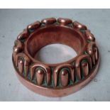 A Benham and Froud Copper Food Mould, circular form with central cavity, mid to late 19th century,