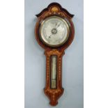 An unusual late 19th/early 20th century Banjo style Barometer in an upside down layout, rosewood and