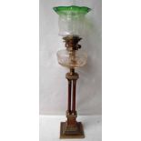 A good quality Edwardian Oil Lamp, oak and brass with graduated green to clear etched glass shade,