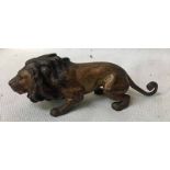 A Bergman Austrian cold painted bronze model of a Crouching Lion, impressed B in sack mark, 12.5cm