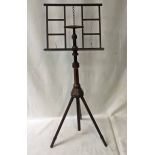 A late 19th/early 20th century Wheeldon's Patent Music Stand, with adjustable column, hinged lectern