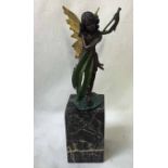 An Art Deco cold painted bronze model of a Fairy holding leaves with gilt wings, impressed MILO to