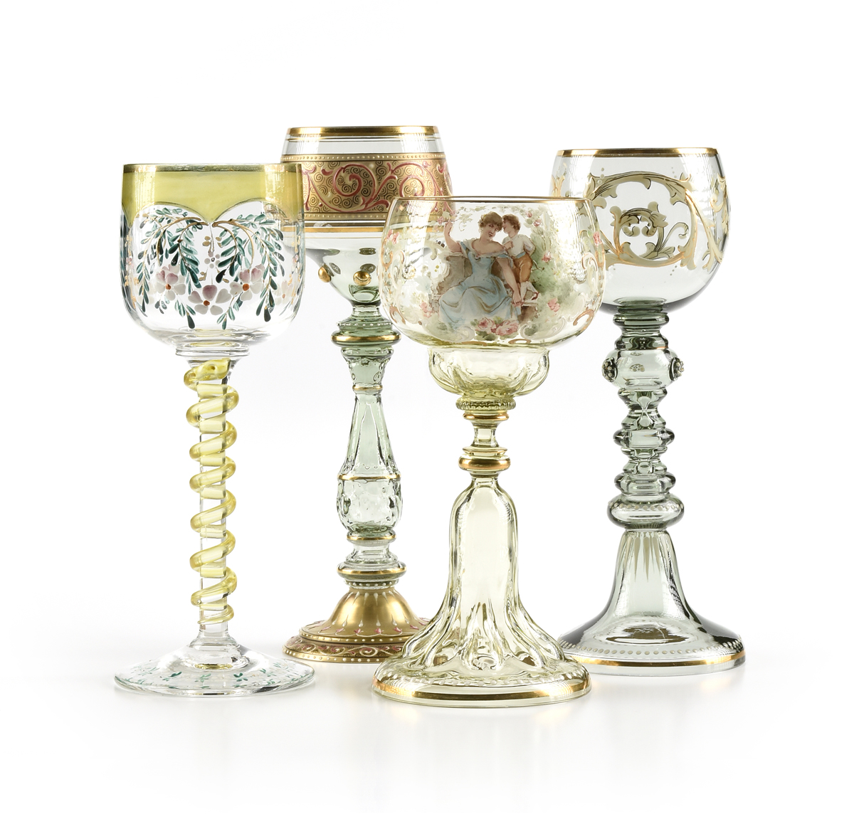 A GROUP OF FOUR BOHEMIAN AND GERMAN GILT AND ENAMEL DECORATED GLASS WINE STEMS, CIRCA 1880-1903,