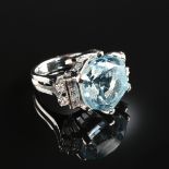 AN 18K WHITE GOLD, BLUE TOPAZ, AND DIAMOND LADY'S COCKTAIL RING.