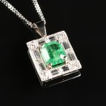 AN 18K WHITE GOLD, EMERALD, AND DIAMOND LADY'S PENDANT, pendant set with one 6.5 x 7.5