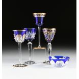 A GROUP OF FIVE BLUE CASED CUT TO CLEAR VESSELS, CONTINENTAL, CIRCA 1900-1950, comprising a Baccarat