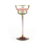 A MEYR'S NEFFE GILT AND TRANSPARENT ENAMEL DECORATED OPTIC GLASS LIQUOR GOBLET, ADOLF BEI