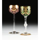 A GROUP OF TWO BOHEMIAN AND FRENCH CASED GILT DECORATED WINE GOBLETS, CIRCA 1900-1910, comprising