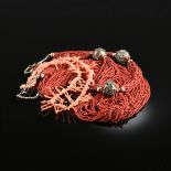 A GROUP OF THREE CORAL NECKLACES, comprising two Native American style seed bead multi strand