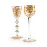 A GROUP OF TWO BOHEMIAN WINE GOBLETS WITH RAISED GILT DECORATION, CIRCA 1900-1920, comprising a