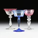 A GROUP OF TWO STEUBEN CHAMPAGNE COUPES AND A CLARET GOBLET, CORNING, NEW YORK, CIRCA 1920-1930,