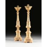 A MATCHED PAIR OF NEOCLASSICAL SILVER GILT WOOD TORCHÊRES/CANDLESTICKS, ITALIAN, LAST HALF 19TH