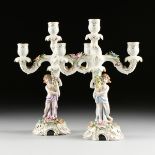 A PAIR OF VON SCHIERHOLZ PARCEL GILT POLYCHROME THREE LIGHT CANDELABRA, GERMAN, EARLY/MID 20TH