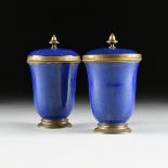 after PAUL MILET (French 1870-1930) A PAIR OF SÈVRES STYLE GILT BRONZE MOUNTED COBALT GLAZED