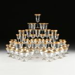 A FIFTY-SIX PIECE SET OF TIFFIN CLEAR OPTIC GLASS WARE WITH GILT BAND DECORATION, TIFFIN, OHIO,