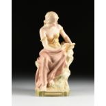 AN ART NOUVEAU PORCELAIN FIGURE OF SIBYL, ROYAL DUX PORCELAIN, BOHEMIA 1860-1913, with bisque and