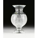 A CASED LARGE WATERFORD CUT CRYSTAL FOOTED VASE BY MASTER CUTTER MICHAEL VEREKER, 2008, of