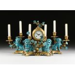 A FRENCH ROCOCO CHINOISERIE STYLE THREE PIECE GILT BRONZE AND PORCELAIN CLOCK GARNITURE, CIRCA 1900,