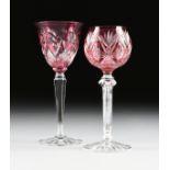 A GROUP OF TWO CONTINENTAL CRANBERRY CUT TO CLEAR WINE GLASSES, CIRCA 1900-1920, comprising a double