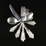 A ONE HUNDRED TWO PIECE SET OF R. WALLACE & SONS MFG. CO. STERLING SILVER FLATWARE IN THE "GRANDE