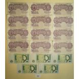 A wad of Band of England ten shilling and £1 bank notes including mauve issue 10 shillings K O