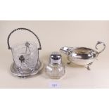 A silver plated and cut glass bowl on stand, silver plated sauce boat and a sugar caster