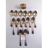 A set of twelve silver teaspoons - 240g, a napkin ring and other spoons